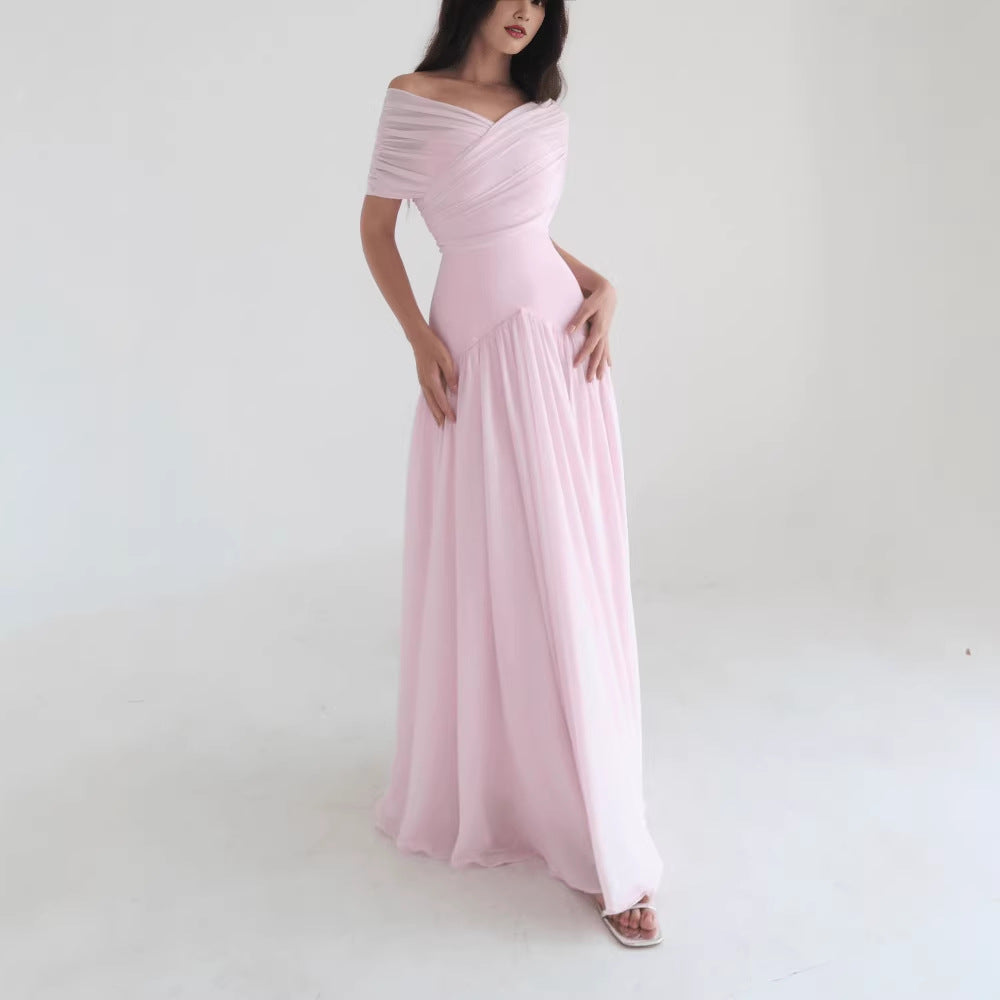 A gentle and romantic short-sleeved long dress with a light and elegant cross-design for women's wear